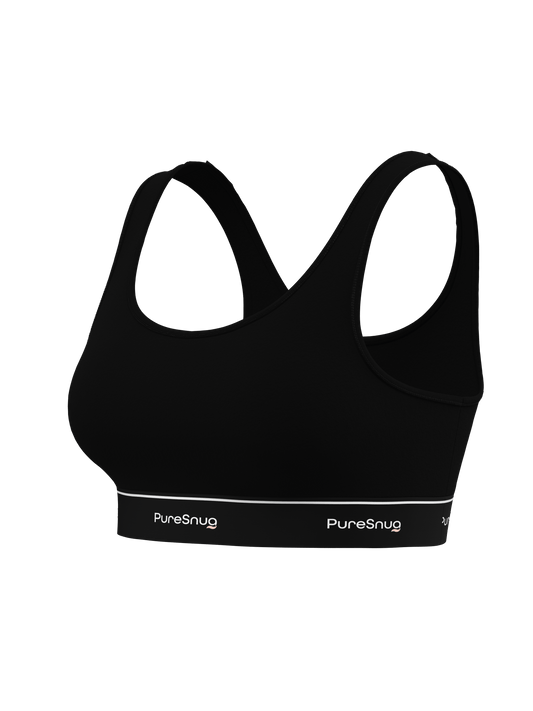 Side angle of PureSnug Classic Black Crop Top highlighting its contoured fit, scoop neckline, and signature logo band.