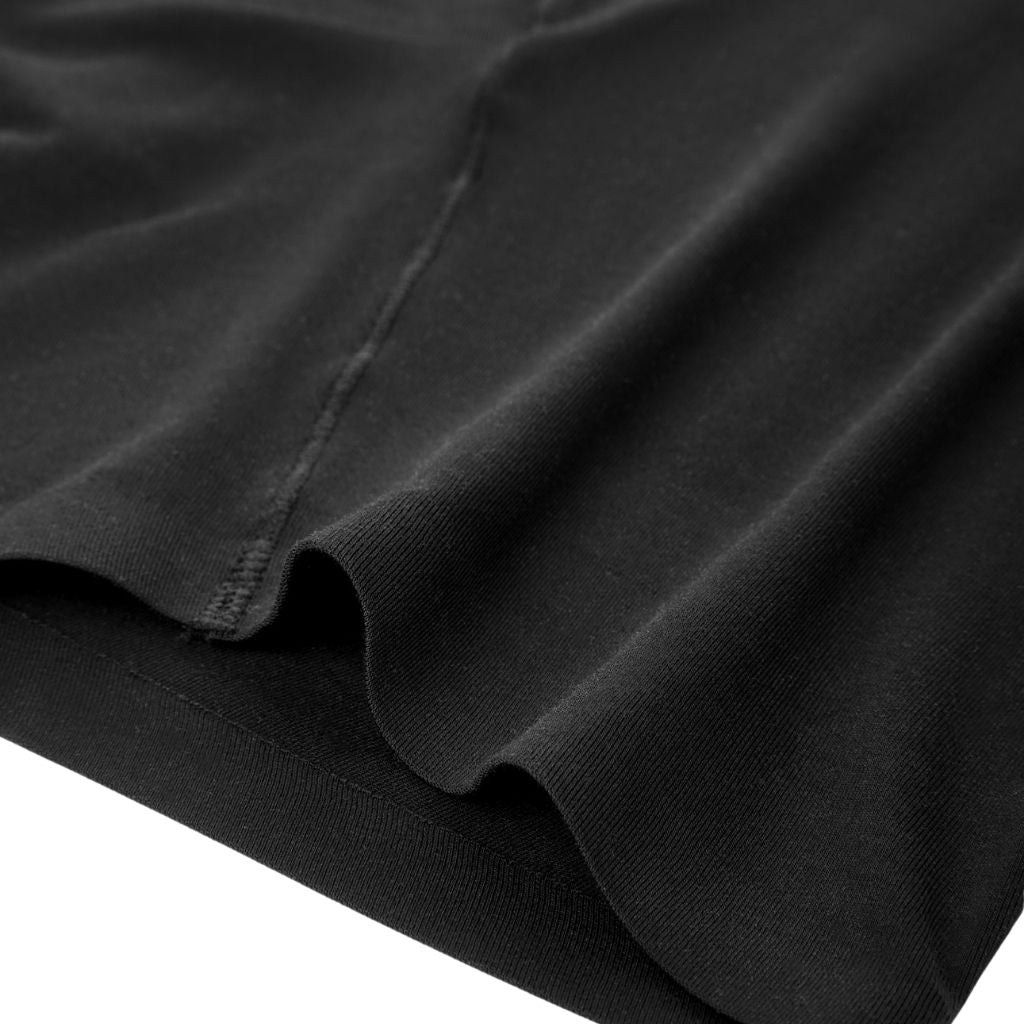 Close-up of PureSnug's black modal fabric with soft folds and a smooth texture, focusing on the stitch detai