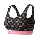 crop top bra with bee and snowflake pattern and pink band, featuring 'PureSnug' branding.