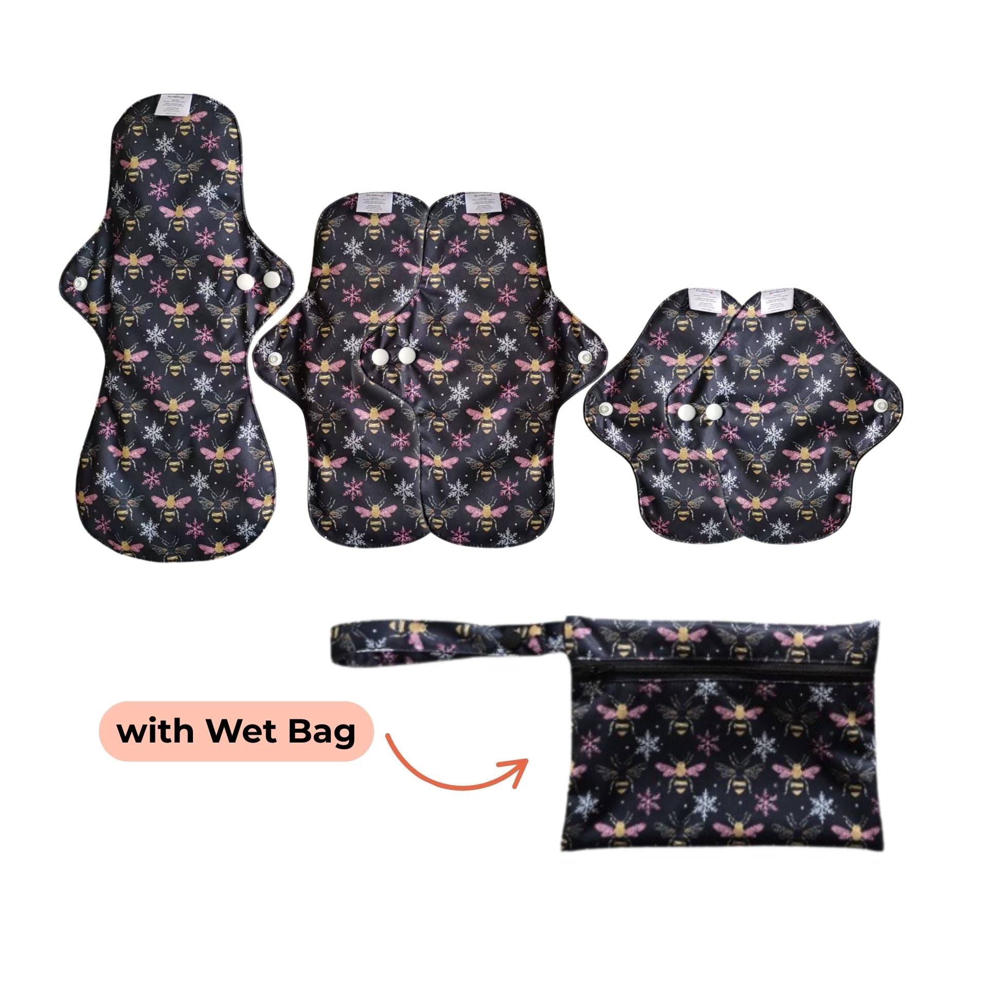PureSnug's Reusable pads with bees and snow flakes print, including a wet bag for storage, displayed in a flat layout.