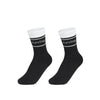 A pair of black crew socks featuring white ribbed cuffs and the "PureSnug" logo in the center. Stylish, comfortable design.