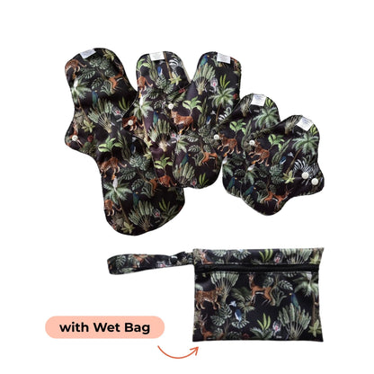 A set of PureSnug's reusable cloth menstrual pads featuring animal and plant patterns, accompanied by a matching wet bag for storage.