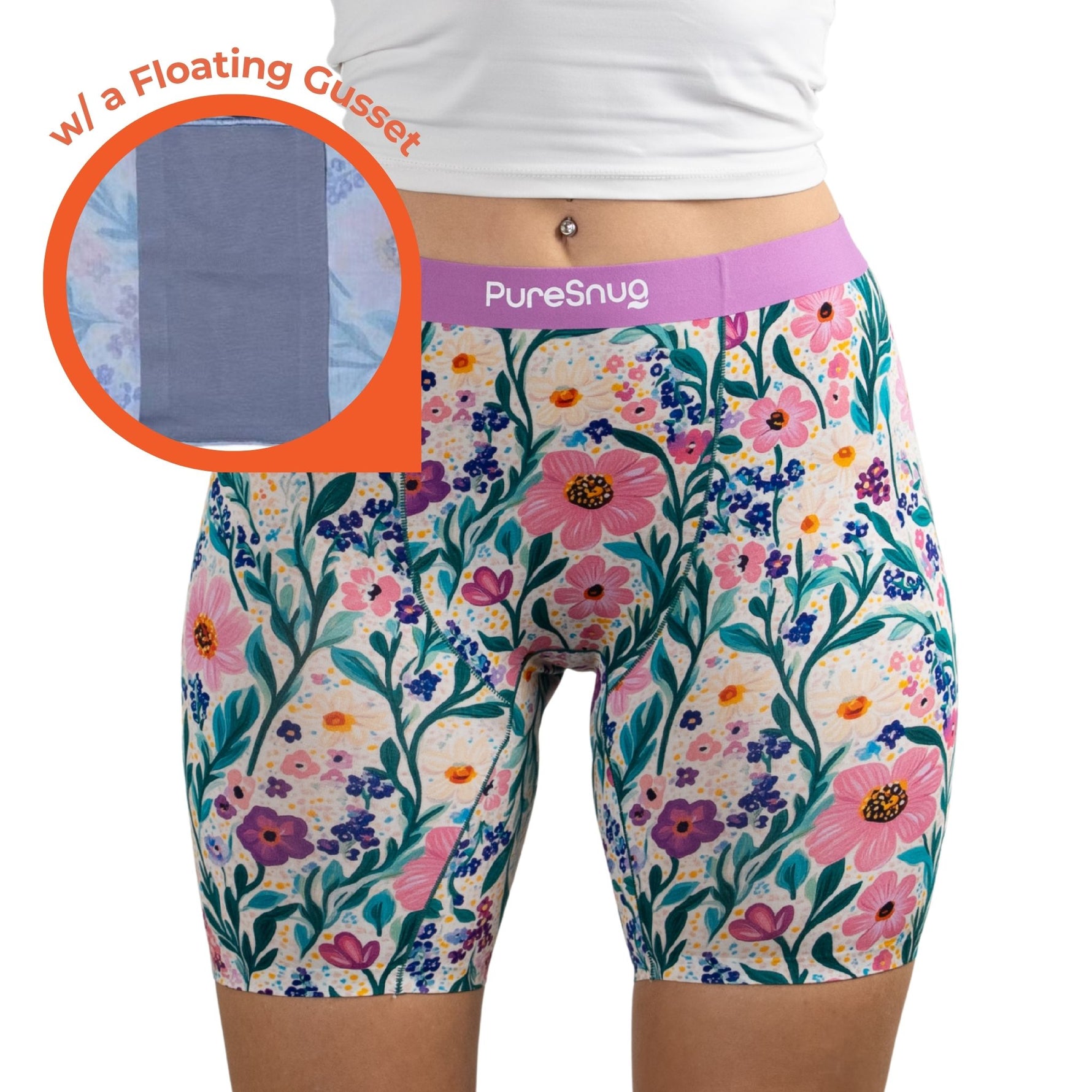Floral-patterned Pure Snug underwear with a floating Gusset feature, displayed on a person wearing a white shirt.