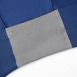 Close-up of soft blue fabric featuring an attached gray gusset.
