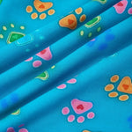 PureSnug’s “Pawfect” lounge short fabric in bright blue with overlapping folds that highlight its soft texture and vibrant hues.