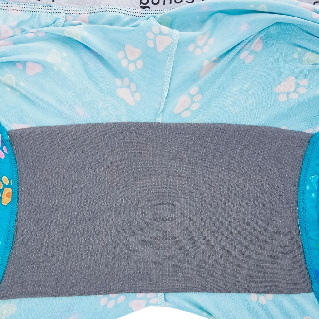 PureSnug bright blue fabric with pastel paw prints and heart shapes, featuring a wide, textured gray gusset for contrast