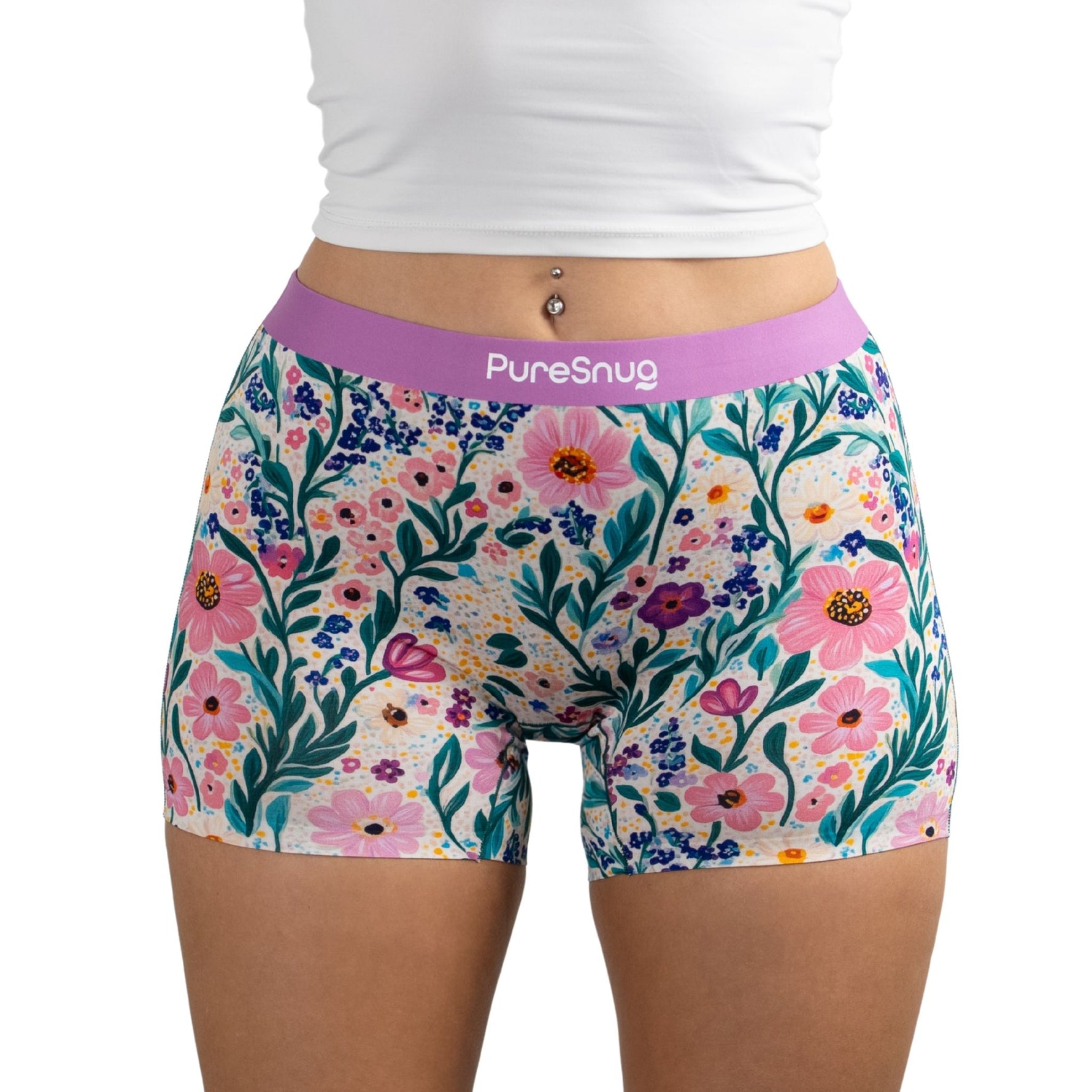 Person wearing Meadow Muse floral print PureSnug boyleg boyshort underwear with white crop top