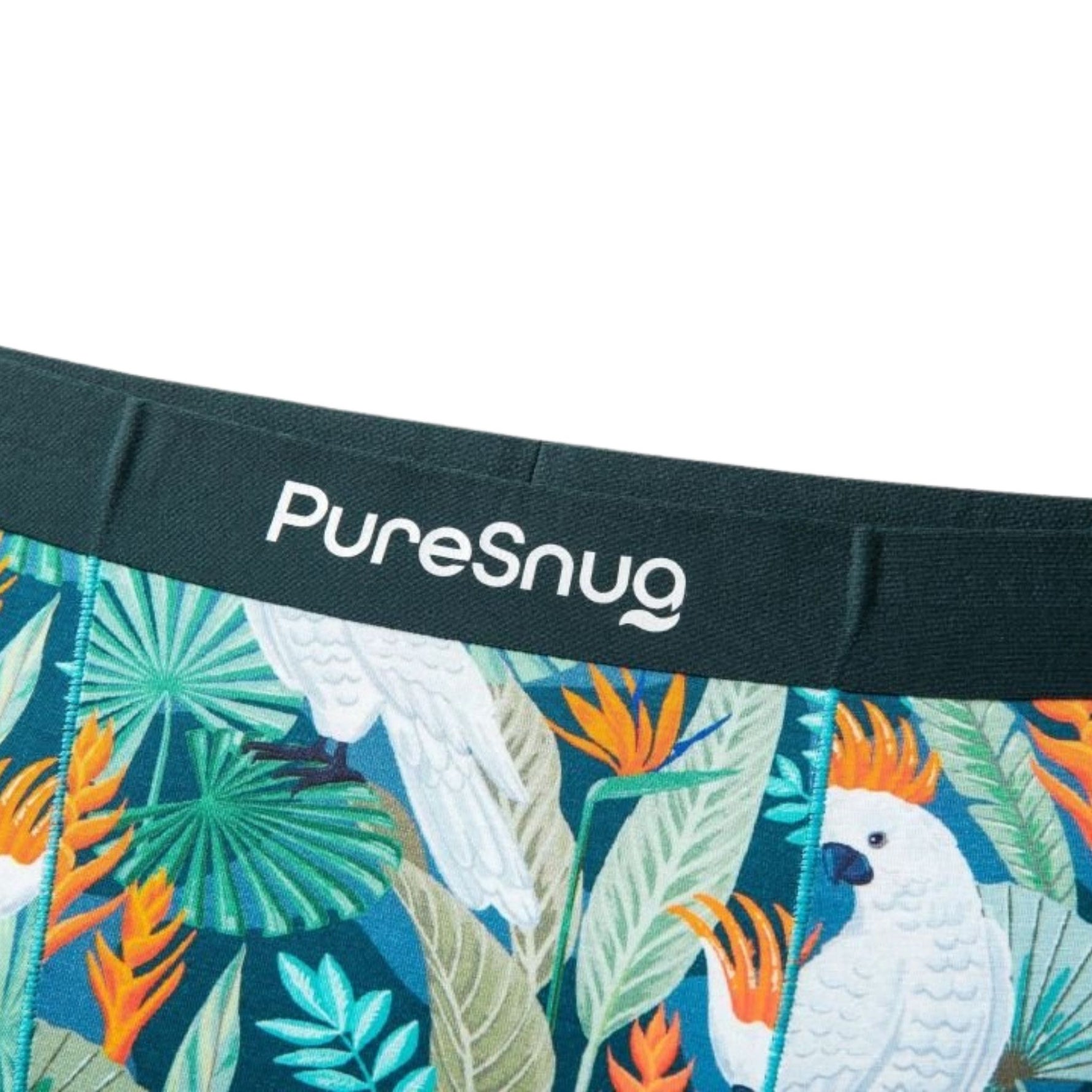Tropical leaf and parrot patterned underwear with 'PureSnug' branding.