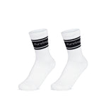 White athletic socks with black stripes and “PureSnug” cuffs, set on a plain background for a clean, crisp look.