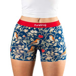 Blue patterned boxer briefs with red waistband and 'PureSnug' branding on a white background.