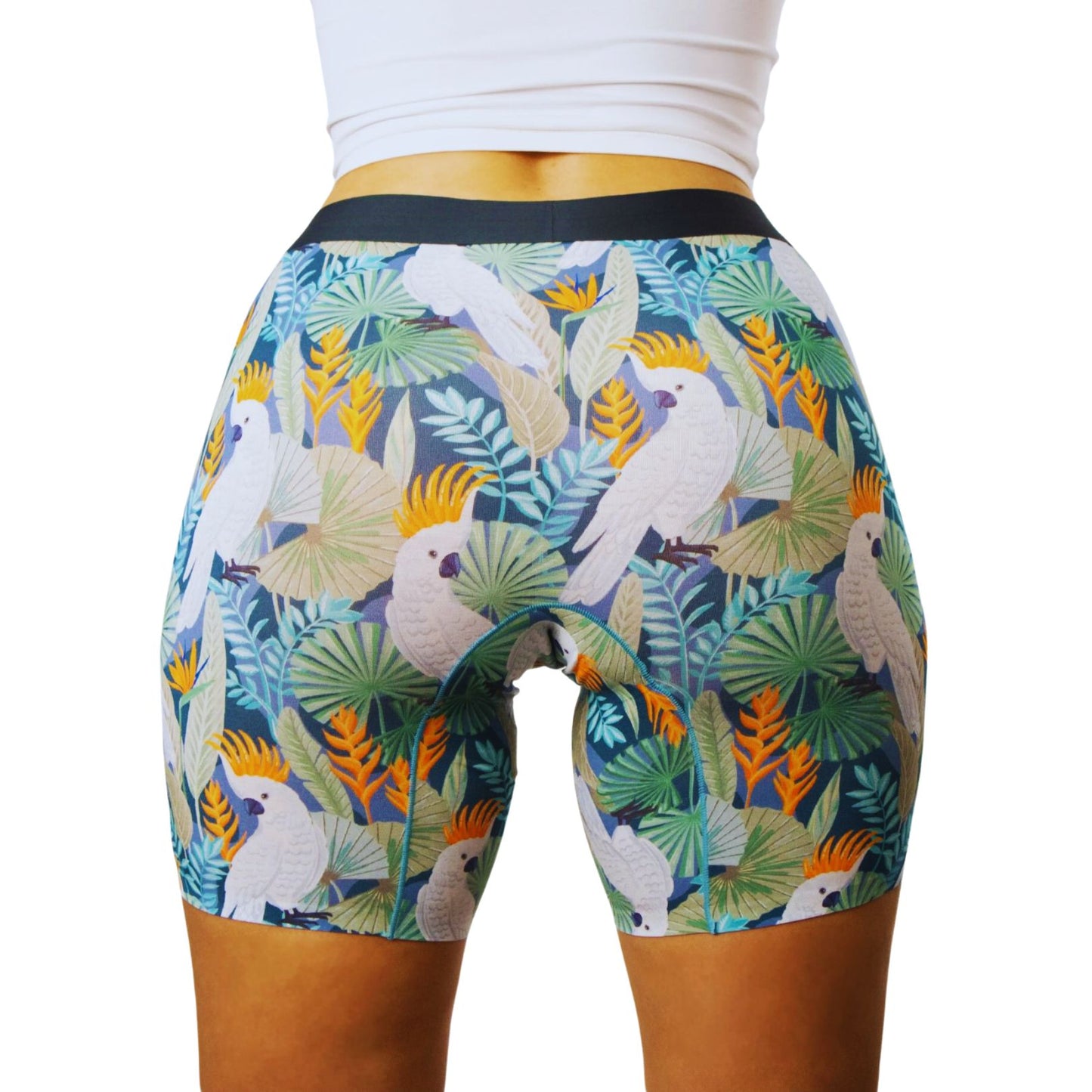 PureSnug ladies' boxer briefs in cockatoo print, australian native bird print,  in a green background, back view, AU