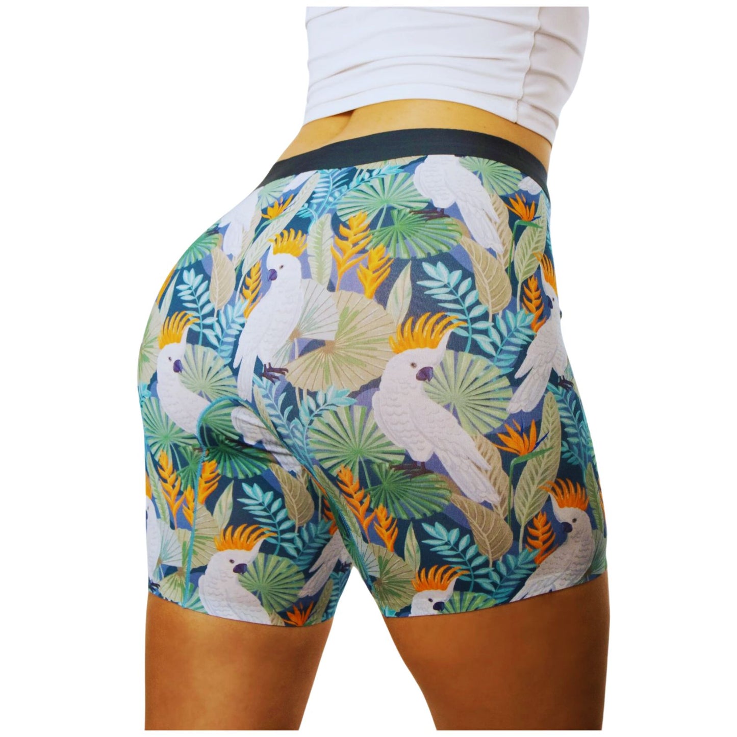 PureSnug ladies' boxer briefs in cockatoo print, australian native bird print,  side view, in a green background, AU