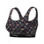 A women's sports bra by PureSnug featuring a dark navy blue base with an all-over print of yellow and black bumblebees, pink flowers, and white snowflakes. The bra has a wide, supportive underband with the brand name 'PureSnug' printed in white.