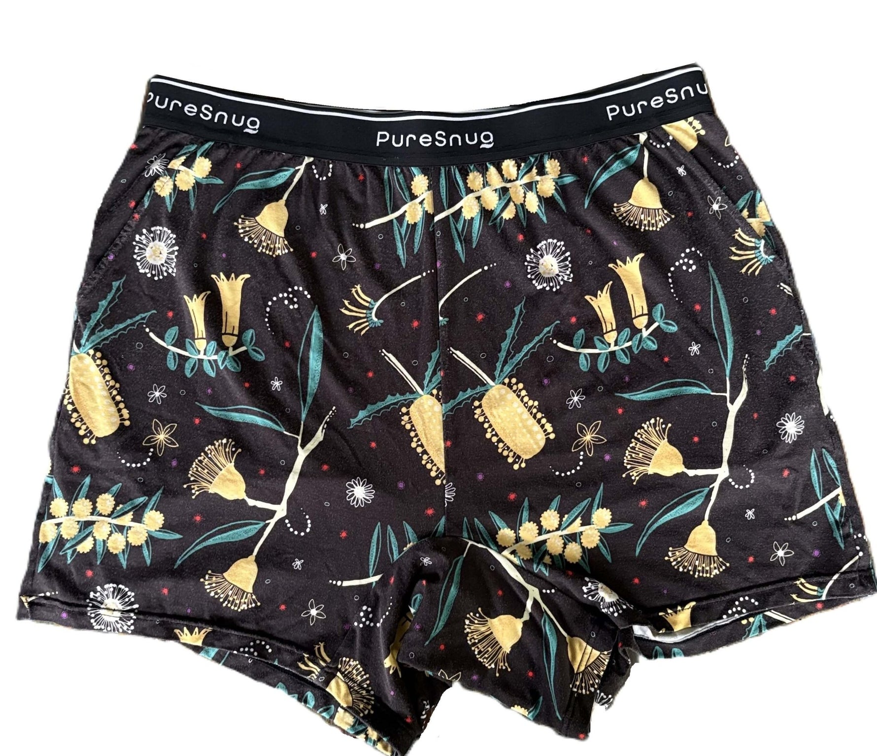 Floral-patterned boxer briefs with 'PureSnug' branding on a white background