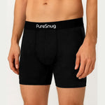 A person wearing black boxer briefs with a waistband labeled "PureSnug."