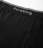 Close-up of Pure Snug’s soft, breathable modal fabric and signature elastic waistband with logo.