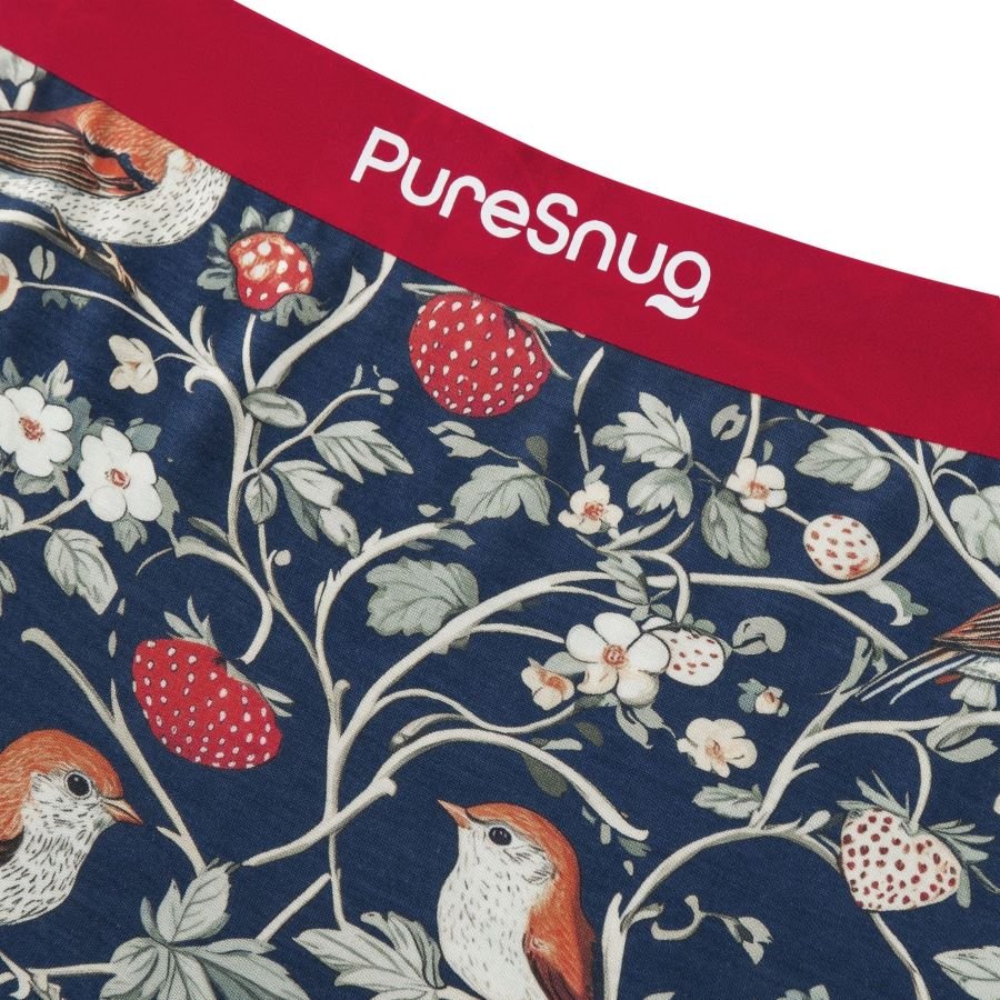 Fabric with bird and strawberry pattern and 'PureSnug' branding